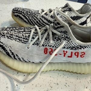 Yeezy Kids Black and Cream Sneakers